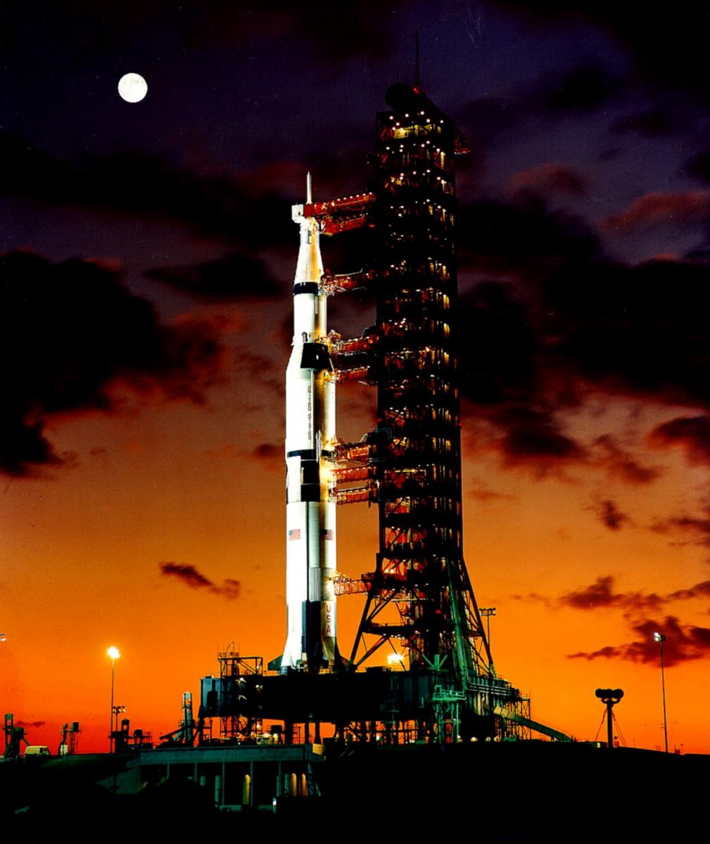 A Saturn V on the pad with the moon in the background, i think it's very fitting.