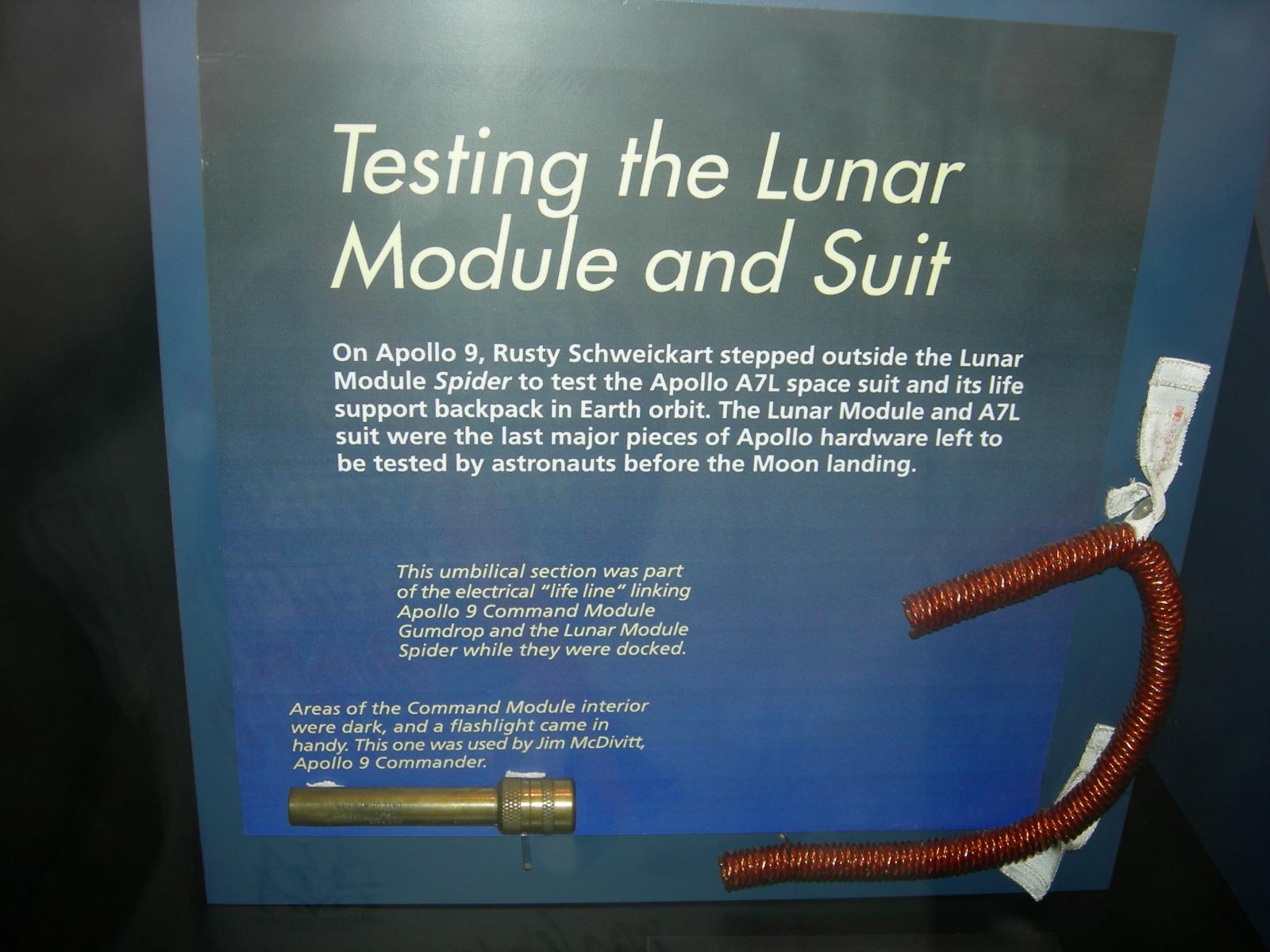 An umbilical used on Apollo 9 and a flashlight used by Jim McDivitt on the same mission