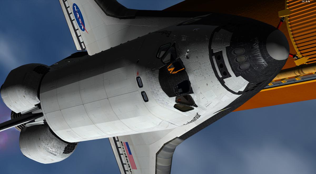 Another close up view during 2nd stage ascent: the huge light/shadow contrast highlights the Orbiter skin details.