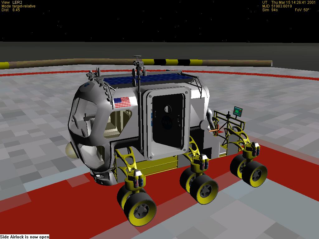 LER with side air lock door open ready for EVA