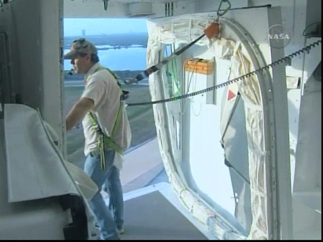 Orbiter Access Arm being extended after rollout of STS-124.
