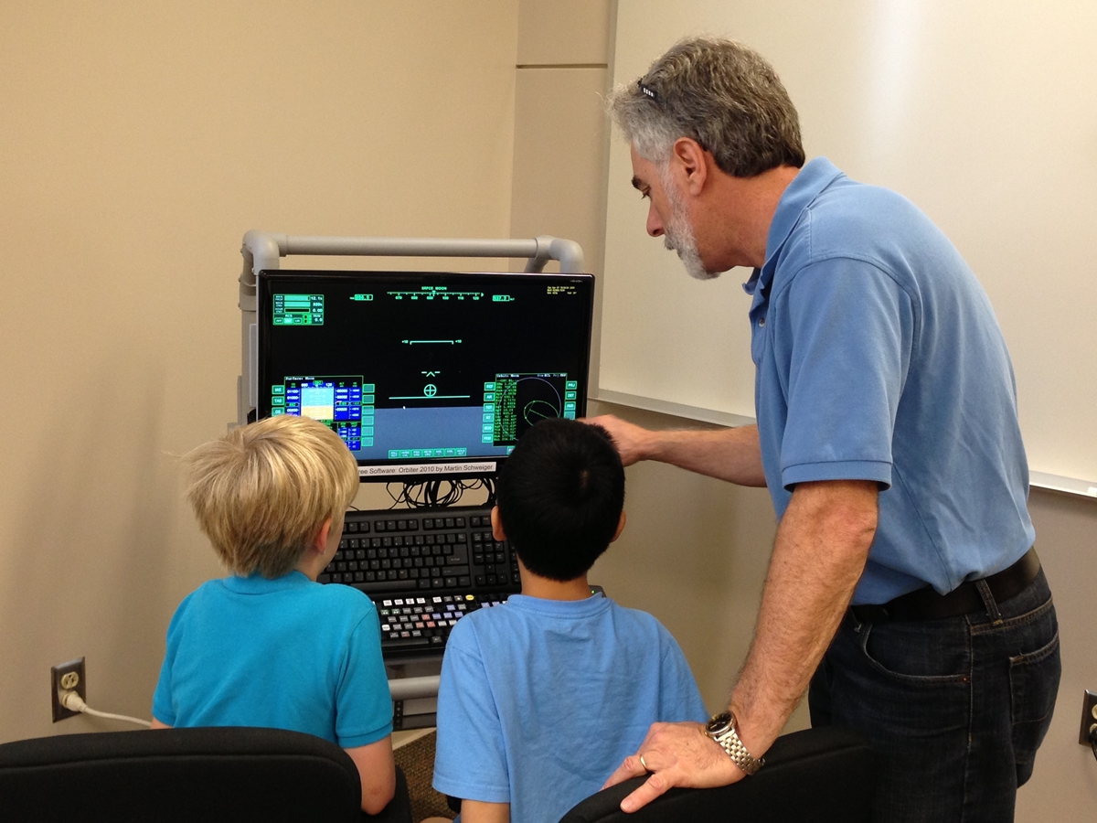 Orbiter Space Flight Simulator at a science day camp for kids, July 2013