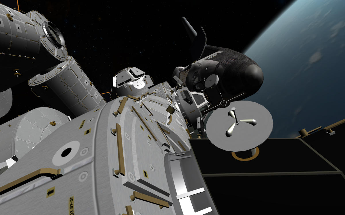 Returning to airlock after routine maintenance to a PMA. Took this photo of the Space Shuttle Atlantis on her resupply mission to outpost 1.