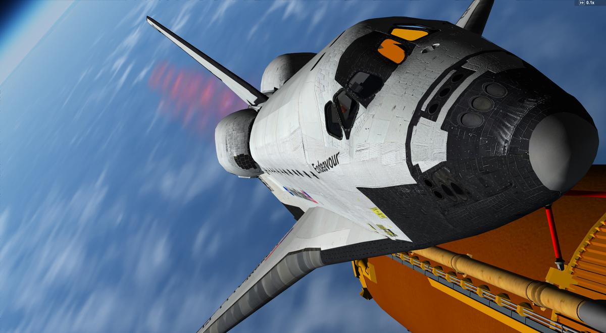 Second stage: the 3 Shuttle Main Engines (the purple exhaust trails are visible behind the orbiter tail section) produce 37 million HP and generate a 