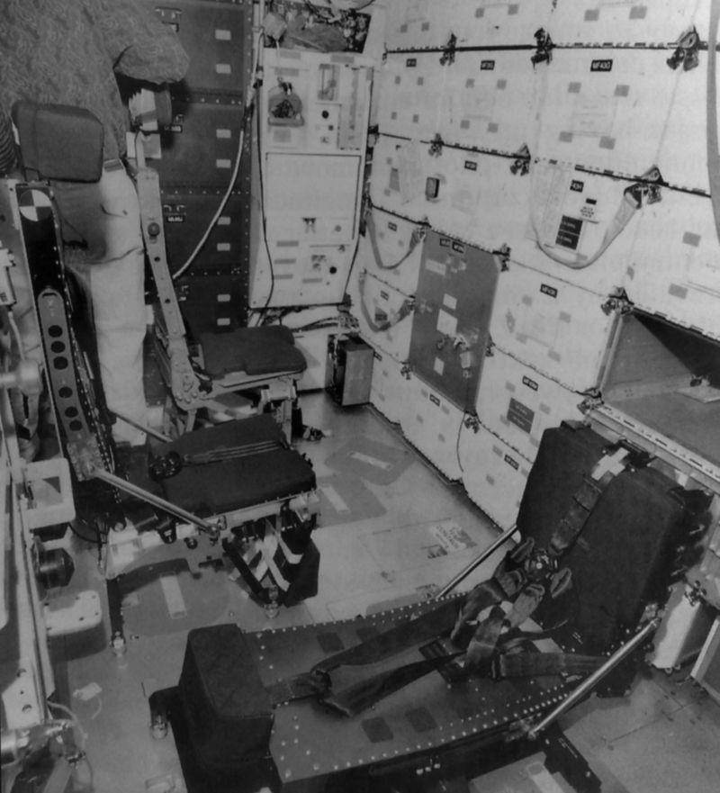 Showing a seat in the reclined position with a locker open
