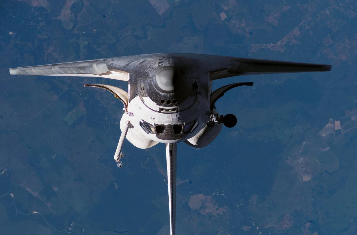 STS 117 overturned Shuttle