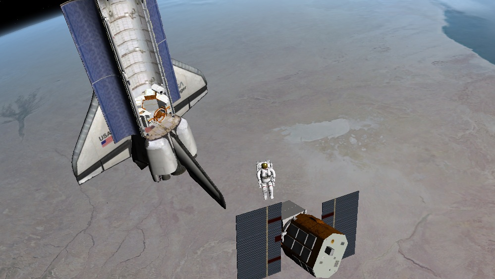 STS 41-C, April 8, 1984.  George "Pinky" Nelson approaches the Solar Maximum satellite.