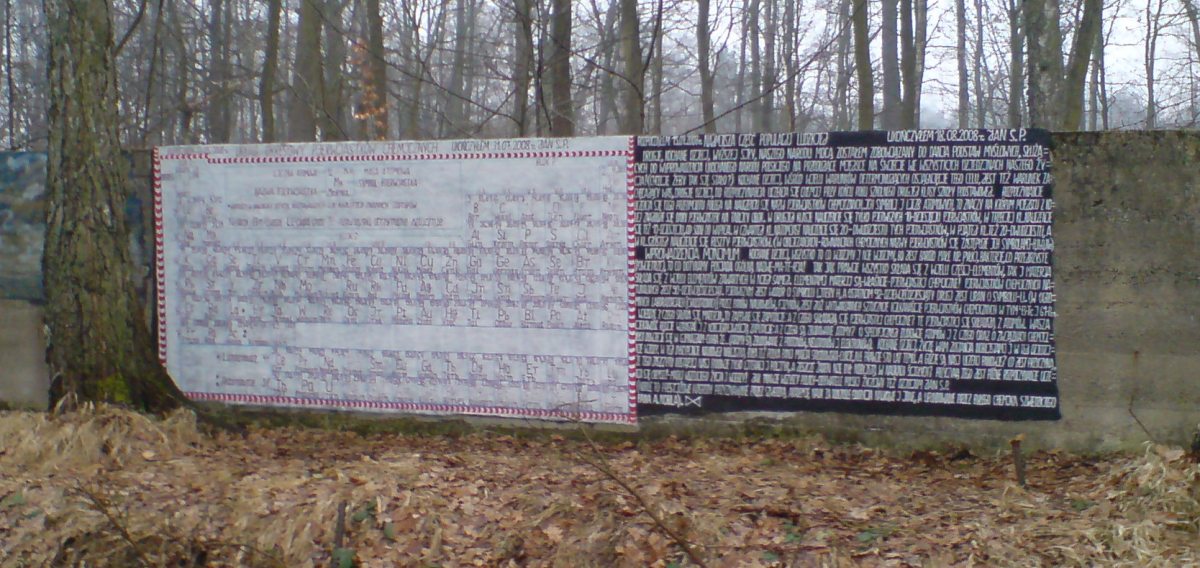 That guy paints various religious and pseudo-science texts on walls surrounding remains of target range from II WW, deep inside a forest nearby. Here,