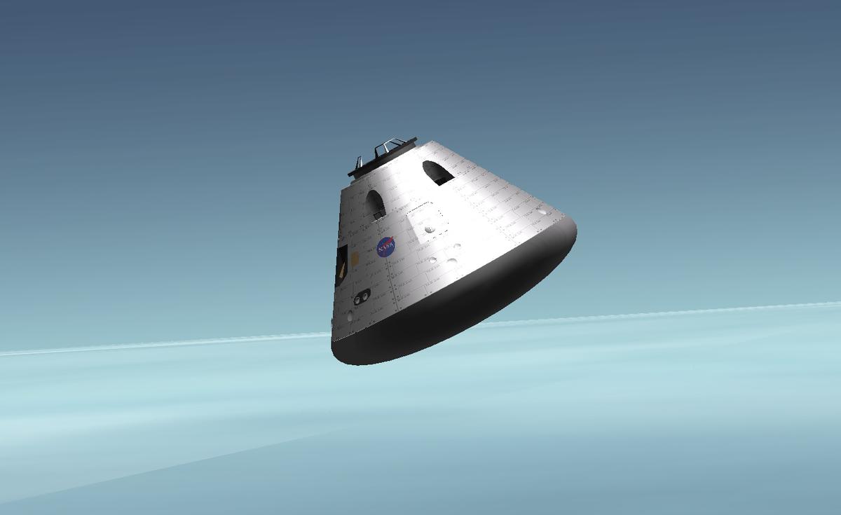 The Orion CM free-falling through Earth's atmosphere.