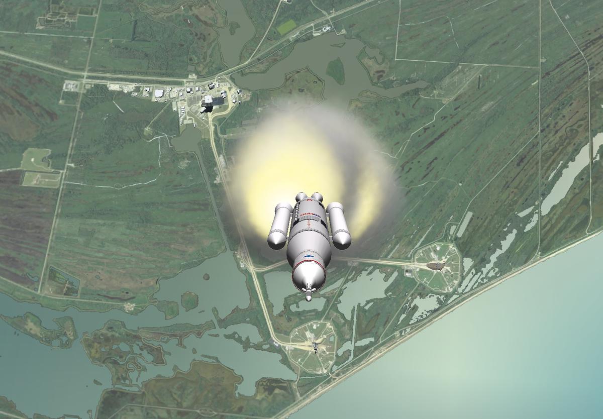 The Space Launch System with the Kennedy Space Center below.