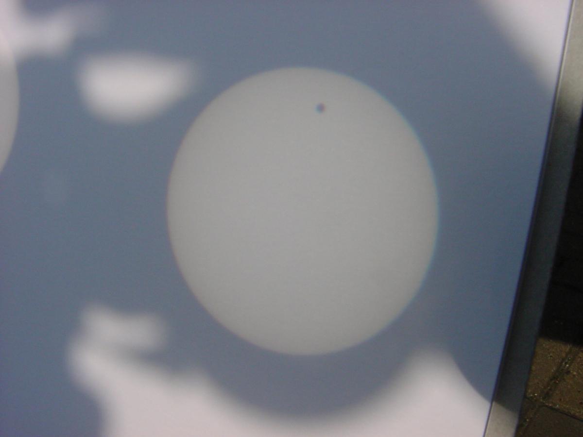 Venus transit 2004 June 8, using a pair of binos.